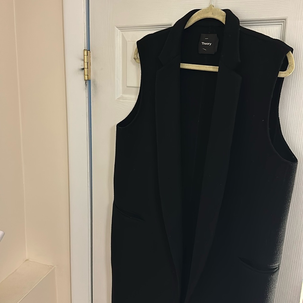 Sleeve pocket trench vest